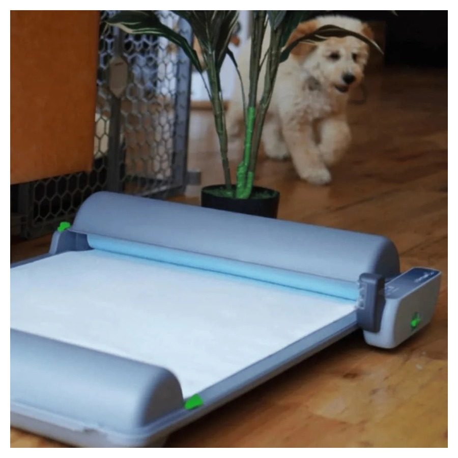 BrilliantPad Smart automatic dog toilet station, three-quarter view with a clean pad